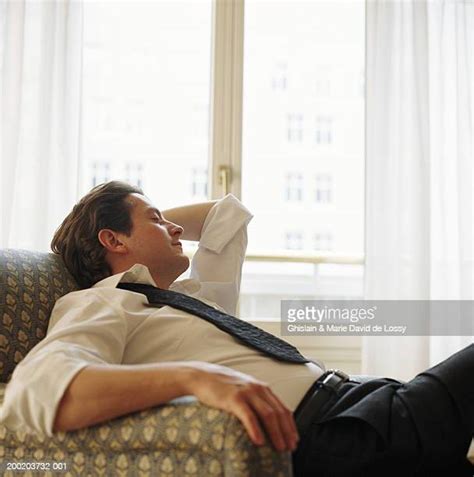 Man Slumped In Chair Bildbanksfoton Och Bilder Getty Images