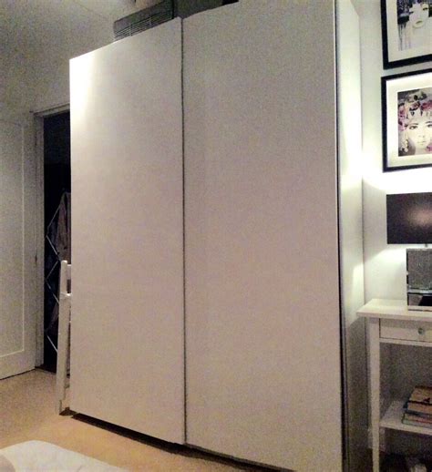 Sliding wardrobe doors dont take any space to open but they do add modern style to a room. IKEA Pax Double Wardrobe Sliding Doors - White | in ...