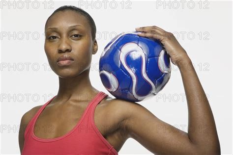 African American Woman Holding Soccer Ball Photo12 Tetra Images Paul
