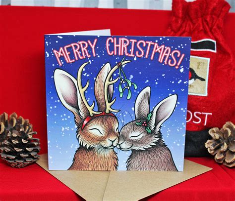 Eight Rabbit Christmas Cards With Charity Donation By Lyndsey Green