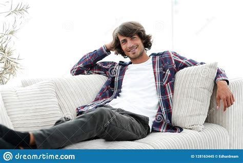 Serious Modern Guy Sitting On The Couch Stock Image Image Of Lifestyle Creativity