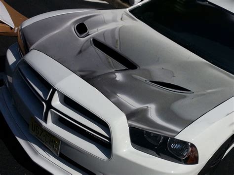 In the database of masbukti, available 8 modifications which released in 2014: 2011-2014 Dodge Charger Hellcat Style Carbon Fiber Hood