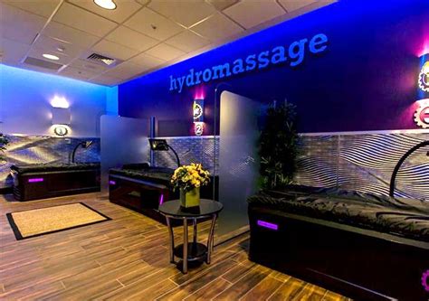 hydromassage zone with in a fitness club with three massage beds fitness club massage bed