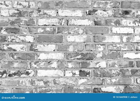 Black And White Photo With Brick Wall Made Of Old Bricks With Different