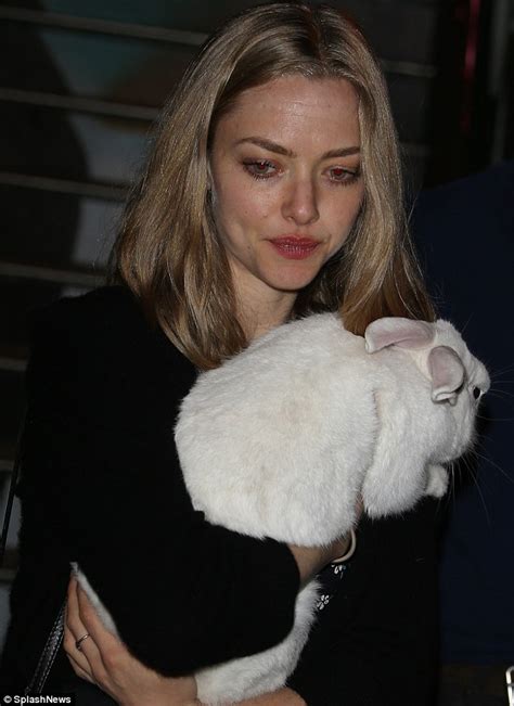 Amanda Seyfried Hugs A Fluffy Bunny Rabbit At Dylans Candy Bar Opening In La Daily Mail Online