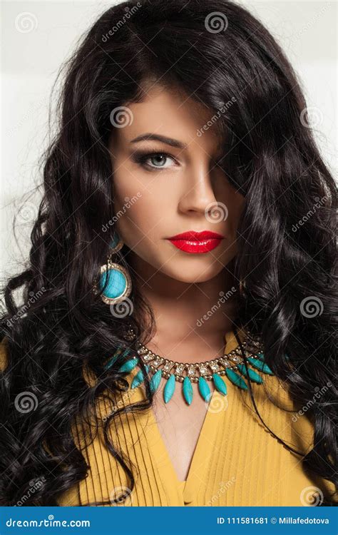 Brunette Girl With Red Lips Makeup And Long Wavy Hair Stock Image