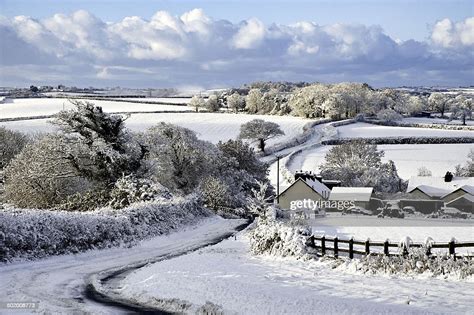 Snow Covered Countryside And Road High Res Stock Photo Getty Images