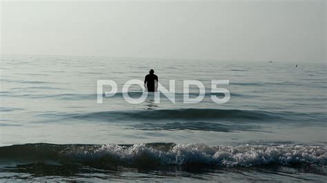 Man entering the ocean Stock Footage #AD ,#entering#Man# 