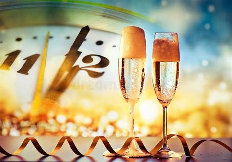 Two Champagne Glasses Ready To Bring In The New Year Stock Image