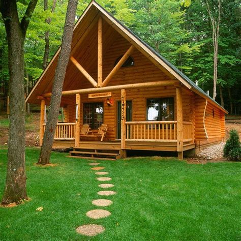 This Cozy Home Has A Spacious Loft Log Cabin House Plans Log Home