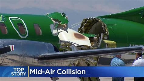 Aftermath Of Denver Mid Air Plane Collision Photos The Courier Mail