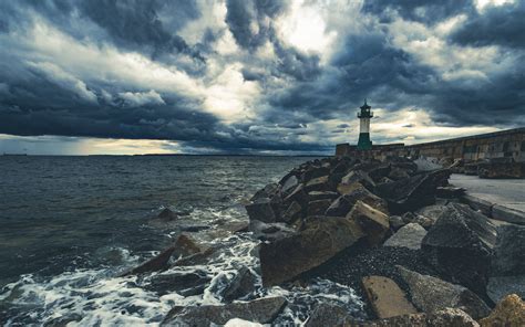 Download Wallpaper 3840x2400 Lighthouse Sea Coast Stones Clouds 4k