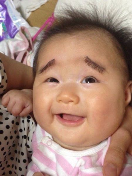 Drawing Eyebrows On Babies Is The Internets Newest Trend E News