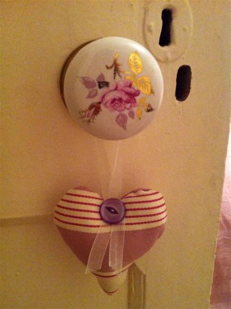 Homemade Fabric Heart Hanging On Floral Doorknob