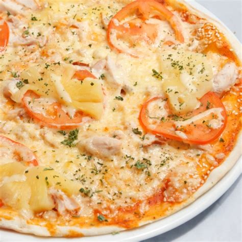 This makes a thin crust pizza so carefully spread it out to the edges. Homemade Thin Crust Pizza Recipe