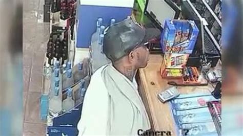 Surveillance Shows Robber Pepper Spraying Clerks Police Look For Suspect