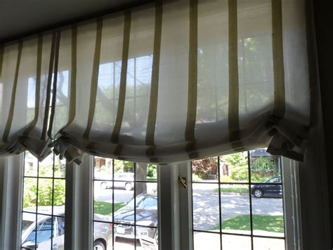 Roman drapery and roman shades are an expressive and elegant addition to any type of window. Jade Creative: Lovely Striped Sheer Roman Blinds