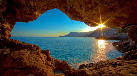 2560x1440 Sunrise Ocean Cave Desktop Pc And Mac Wallpaper