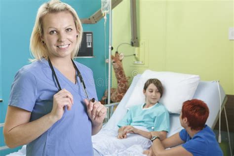 Little Girl In Hospital Bed With The Nurse Stock Image Image Of