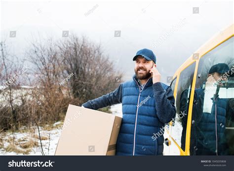 Delivery Man Delivering Parcel Box Recipient Stock Photo 1045035808
