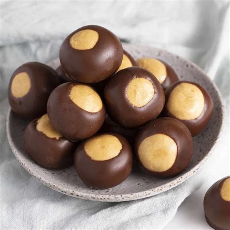 You haven't had a truffle, until you have these chubby hubby buckeye peanut butter truffles. Buck Eye Truffle / Grand Marnier chocolate truffles | Recipe | Truffles ...