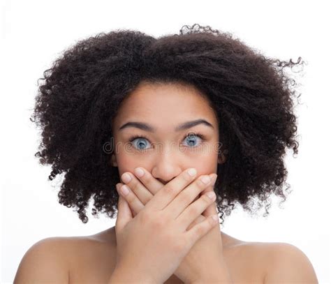 Portrait Of A Scared Young Beautiful African Teenage Isolated On White