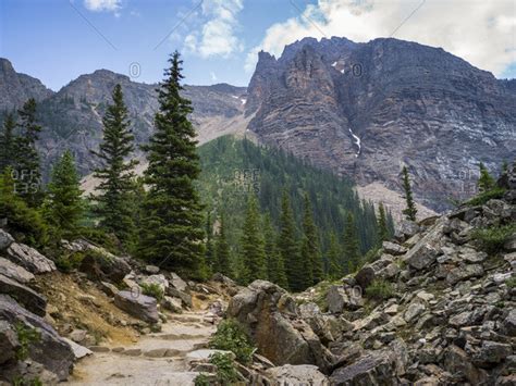 A Trail Leading Through A Rocky Terrain In The Canadian Rocky Mountains