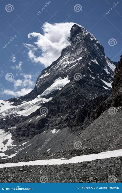 Close Look To Summit Of Matterhorn Mountain Covered By Clouds Stock