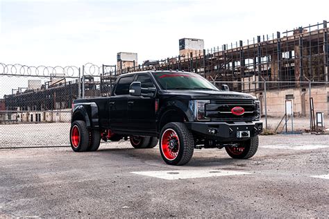 Anger Management Black Lifted Ford F 350 Boasting Red Accents — Carid