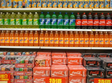1024x768 wallpaper | soda products arranged on retail gondola | Peakpx