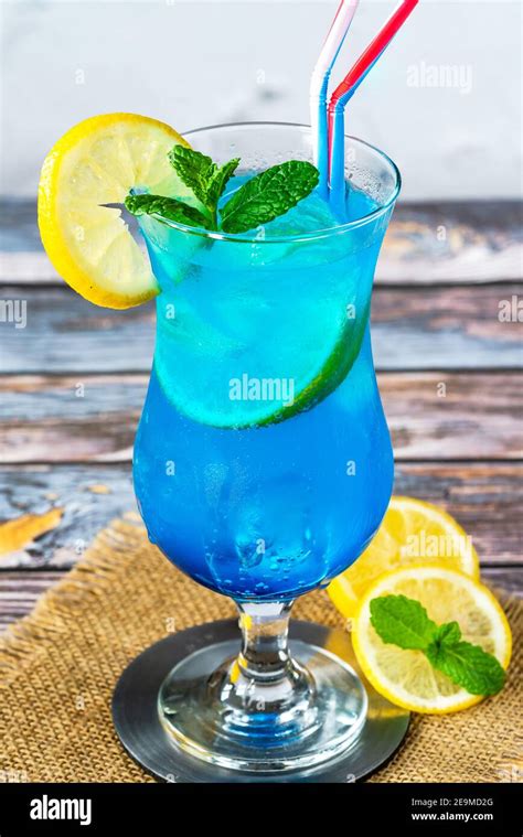 Blue Lagoon Cocktail Of Blue Curacao Syrup Mixed With Vodka And