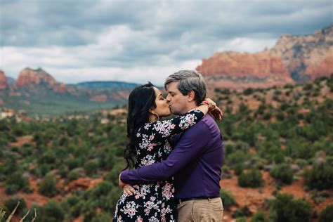 Engaged Couple Kissing Red Rocks Sedona Az Arizona Photographer