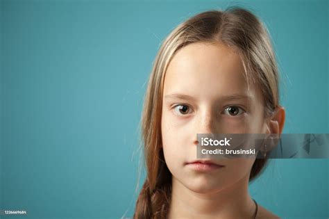 Closeup Studio Portrait Of A 10 Year Old Gir Stock Photo Download