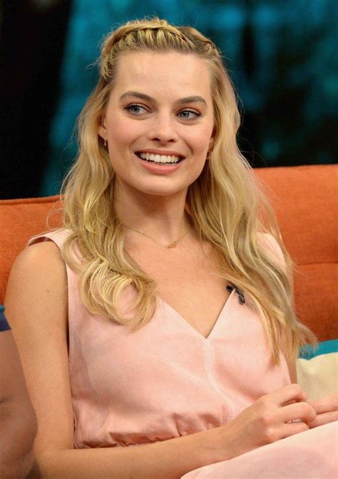 Margot robbie unknowingly followed prince harry into a photo booth. Margot Robbie hairstyles: Her latest red carpet looks ...