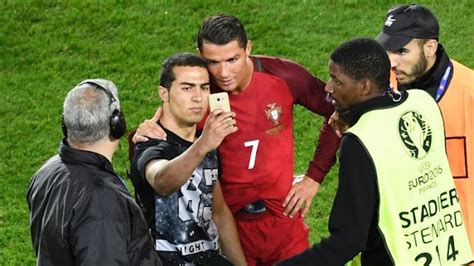 Video Cristiano Ronaldo Selfie Pitch Invader Earns Portugal Uefa Fine