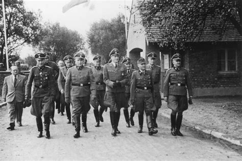 Nazi Officers Walk Towards The Dedication Of The New Ss Hospital In
