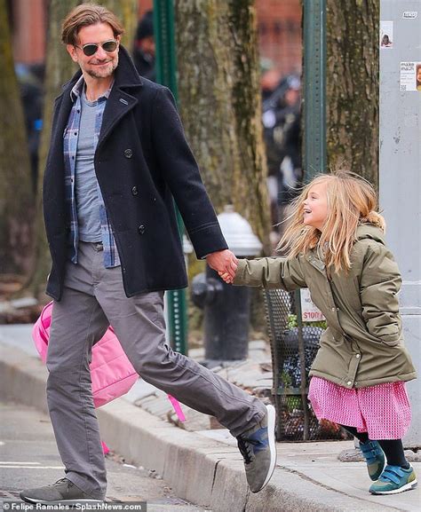 bradley cooper gently holds hands with his 5 year old daughter lea on a new york outing ny