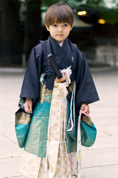 Boy Dressed In Ceremonial Kimono Hakama And Sword Japan Shichigosan