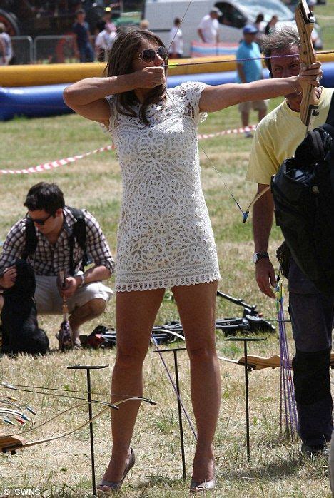 Liz Hurley Draws A Long Bow In Short Dress And High Heels At The