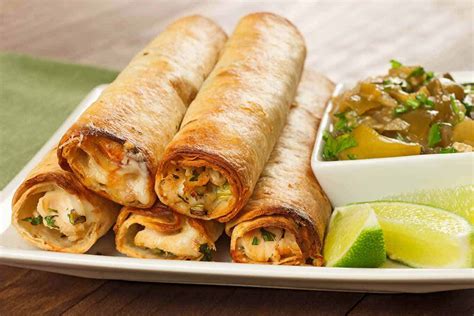 An easy mexican chicken flautas recipe wrapped in corn tortillas and fried on a griddle. Baked Chicken Flautas with Chunky Tomatillo Sauce Recipe ...