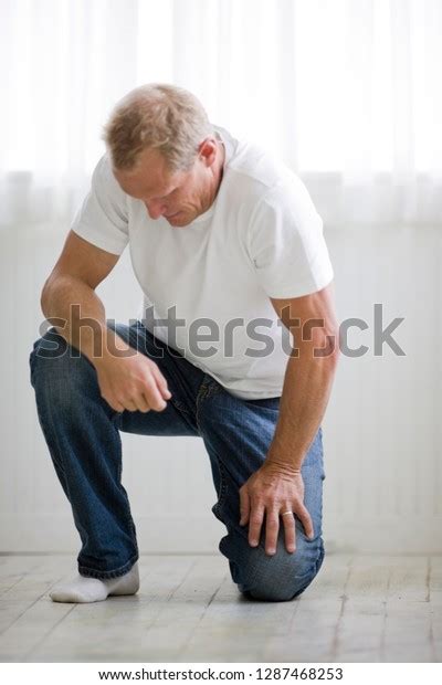 669 Man Kneeling Looking Down Images Stock Photos Vectors Shutterstock