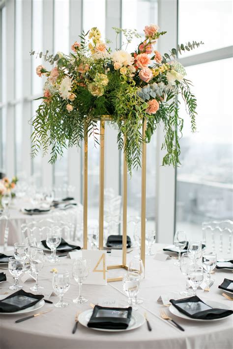 Round Tables With Elegant Tall Centerpieces In 2020 Wedding Table