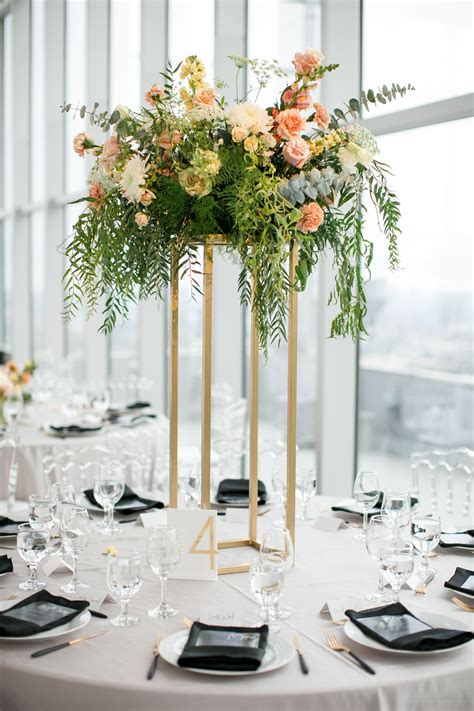 Round Tables with Elegant Tall Centerpieces in 2020 | Wedding table