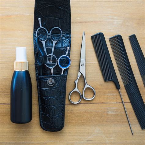 Free Photo Set Of Scissors And Combs