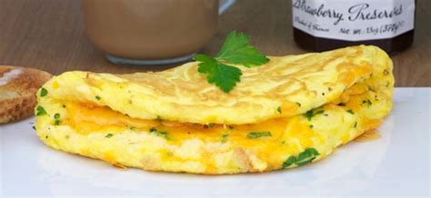 Cheese masala omelette recipe is an easy to make omelette that can be whipped up by any one in less than 20 minutes. Fluffy Cheese Omelette Recipe | MrBreakfast.com