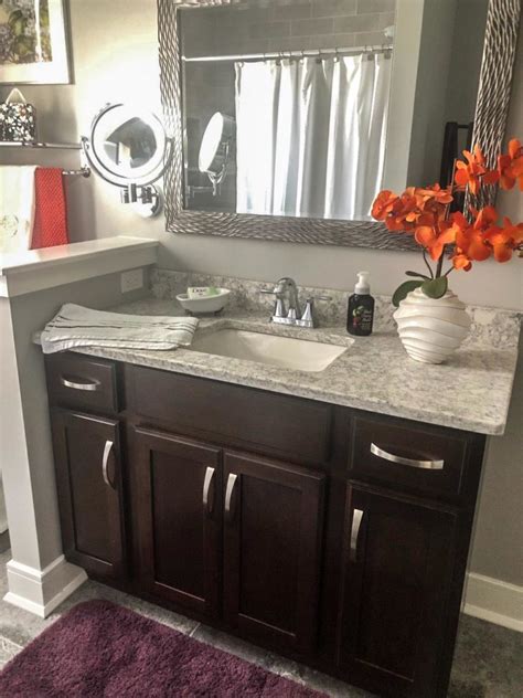 Having a tile inset feature in the middle of the flooring is quite trending. Transitional Cherry Guest Bathrooms in Walnutport, PA by ...