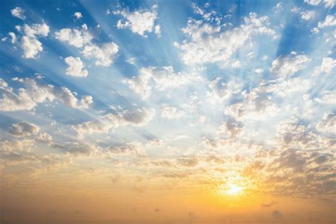 Beautiful Blue Sky With Clouds Sunset And Sunbeams Stock Image Image