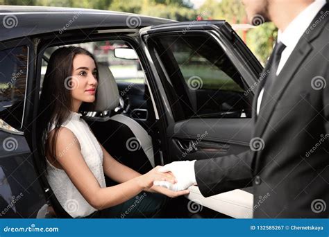 Driver Opening Car Door For Young Businesswoman Stock Image Image Of Private Girl 132585267