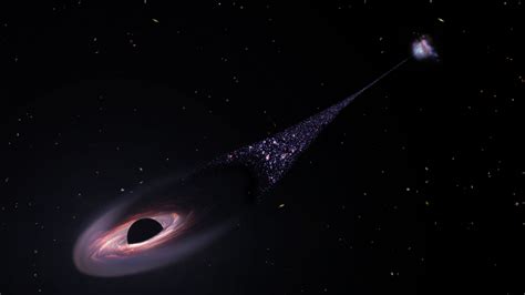 Nasa A Massive Black Hole Is Leaving A Trail Of Stars