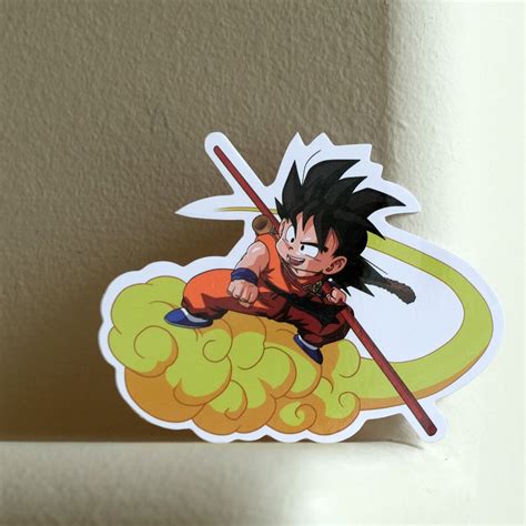 In this art, i wanted to represent all of his innocence and happiness when he goes to an adventure on his flying nimbus! $3.79 - Dragon Ball Z Kid Goku Flying Nimbus Cloud 9X7Cm ...